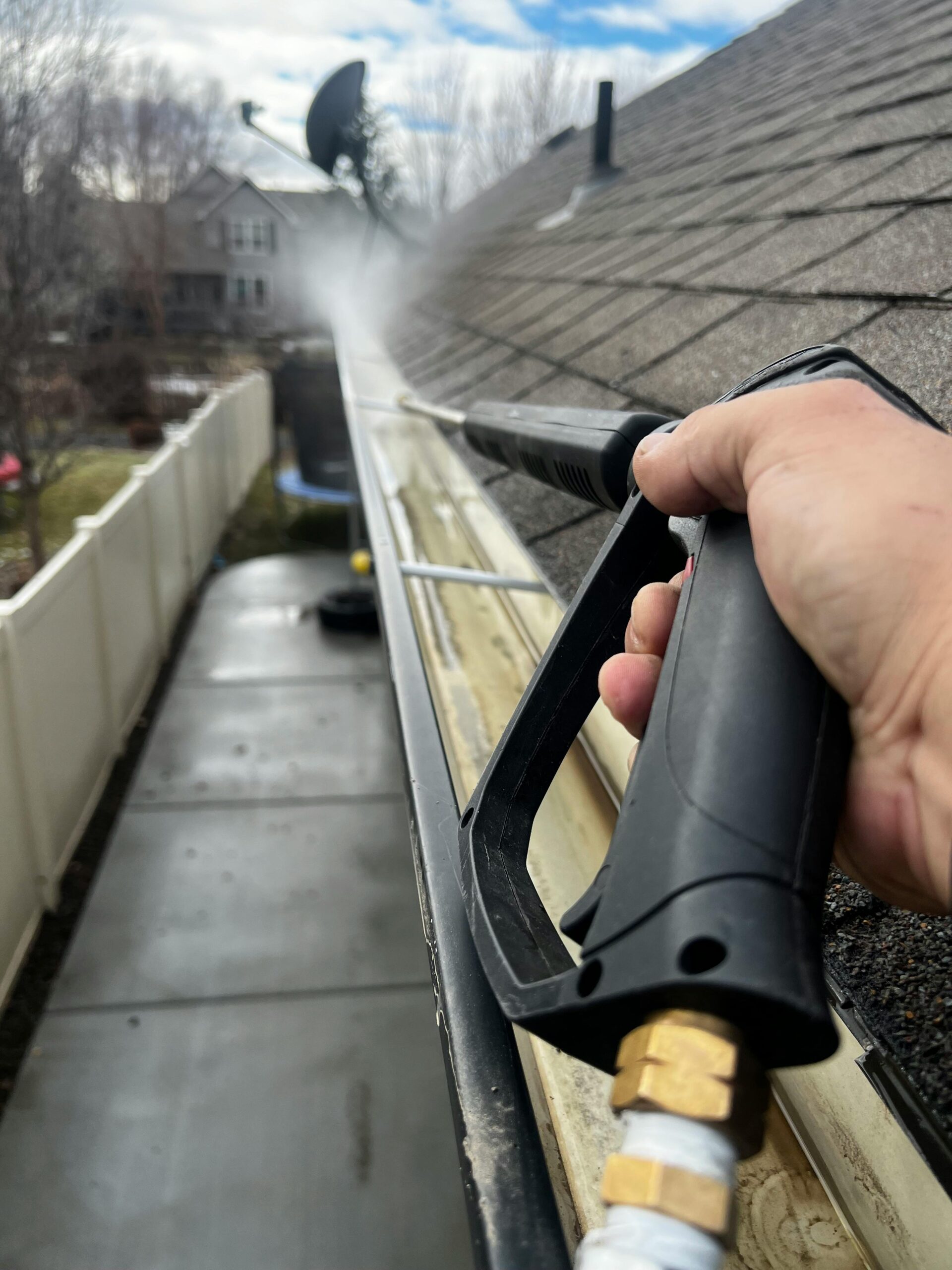 Pressure washing transforming a driveway in Toronto
